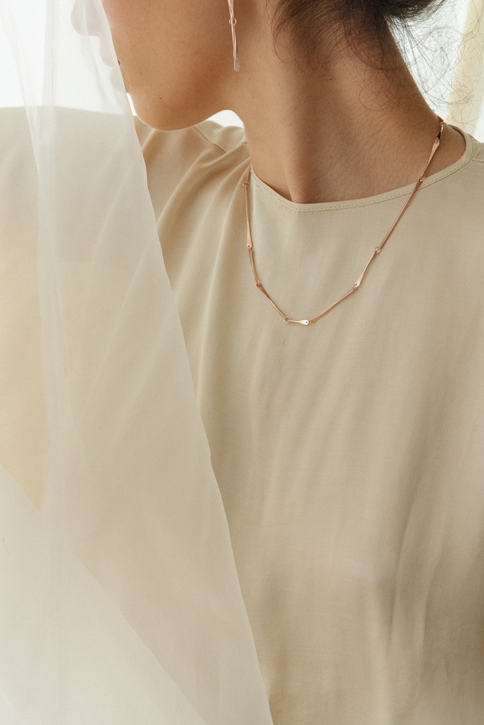 NECKLACE LASSO TWISTED BONE K1.25 Yellow